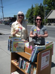 Two if our volunteers, Camrose and Tori, received dandelions of appreciation from a child who picked out books for her siblings - but not herself.